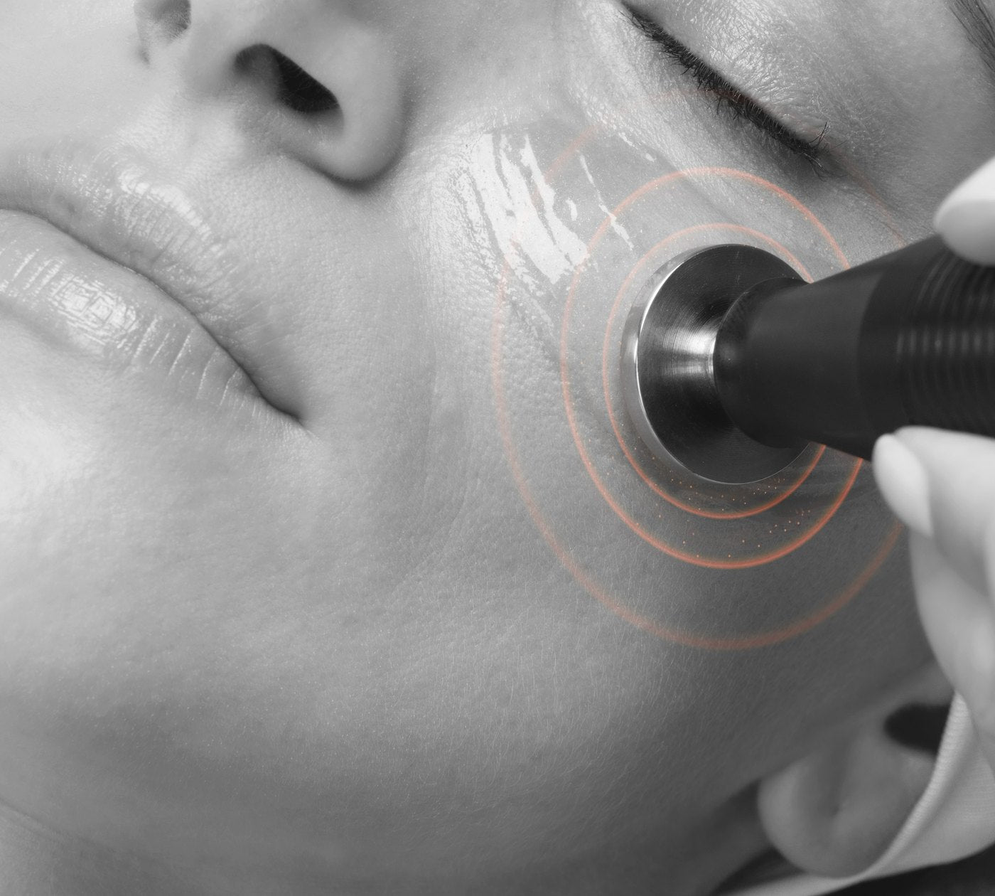 The Environ electro-sonic wand worked over the cheek during a facial